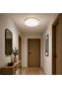 Wave LED ceiling light providing neutral white light in a modern hallway