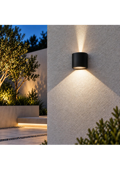 Kiron Round wall light by a garden walkway – up-and-down facade lighting